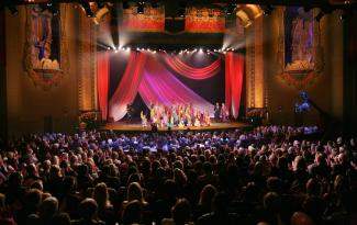 Multicultural performing arts group on stage at Balboa Theatre